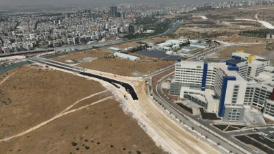 ŞEHİR HASTANESİ YOLUNDA ASFALT SERİMİ BAŞLADI
