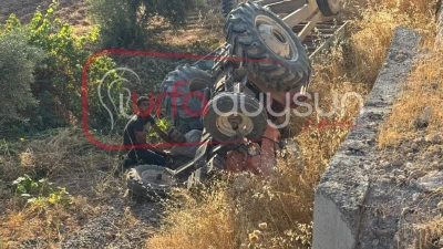 URFA’DA FECİ KAZA! TRAKTÖR ŞARAMPOLE DEVRİLDİ, SÜRÜCÜ ALTINDA KALDI